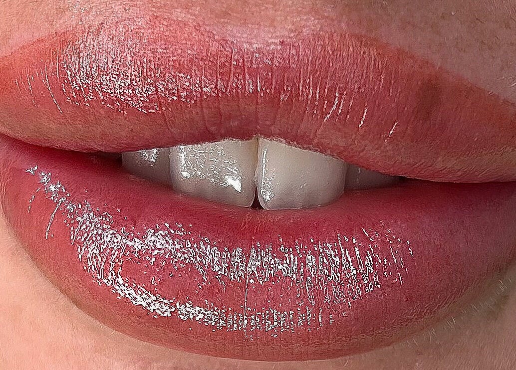 Close-up of glossy lips showcasing makeup from VV Permanent Make Up - Sidcup, Sidcup, England, GB.