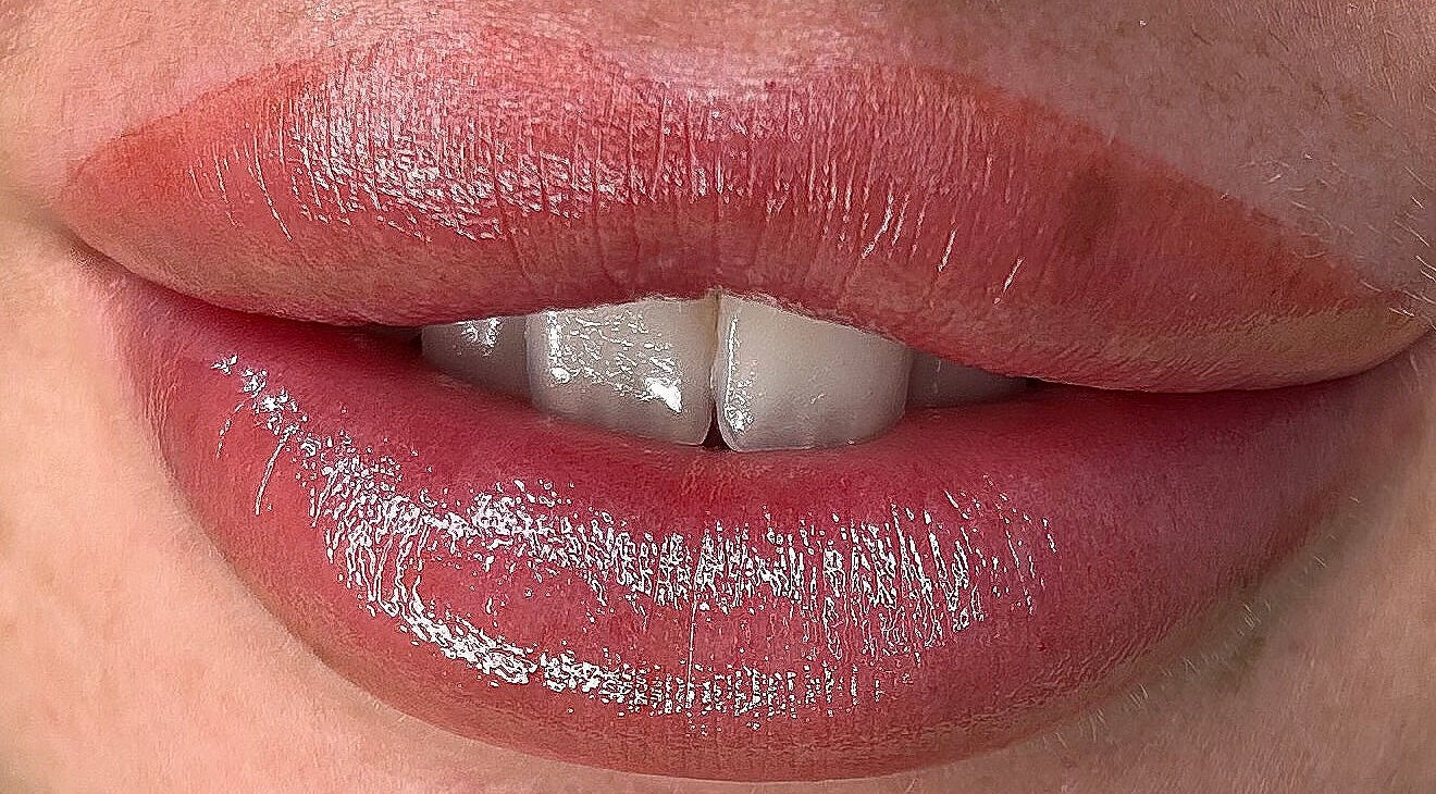 Close-up of glossy lips showcasing makeup from VV Permanent Make Up - Sidcup, Sidcup, England, GB.