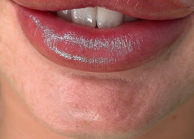 Close-up of glossy, well-maintained lips at VV Permanent - Hornchurch Training Location, Hornchurch, England, GB.