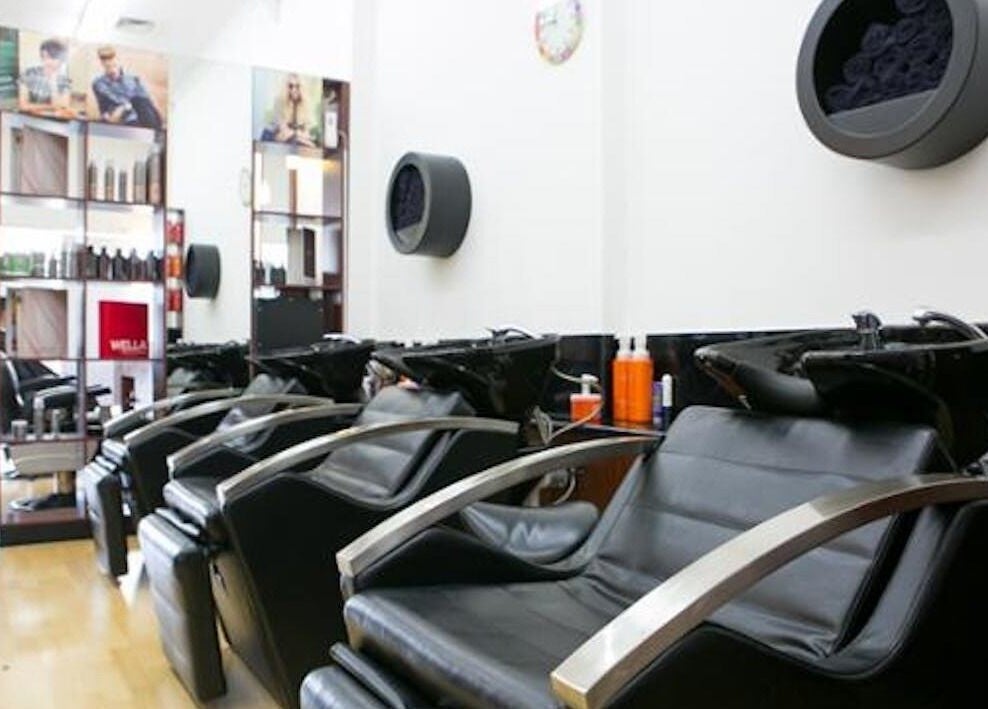 Modern wash stations at Hair Hut Camberwell, Melbourne, Victoria, AU offering a sleek, comfortable salon experience.