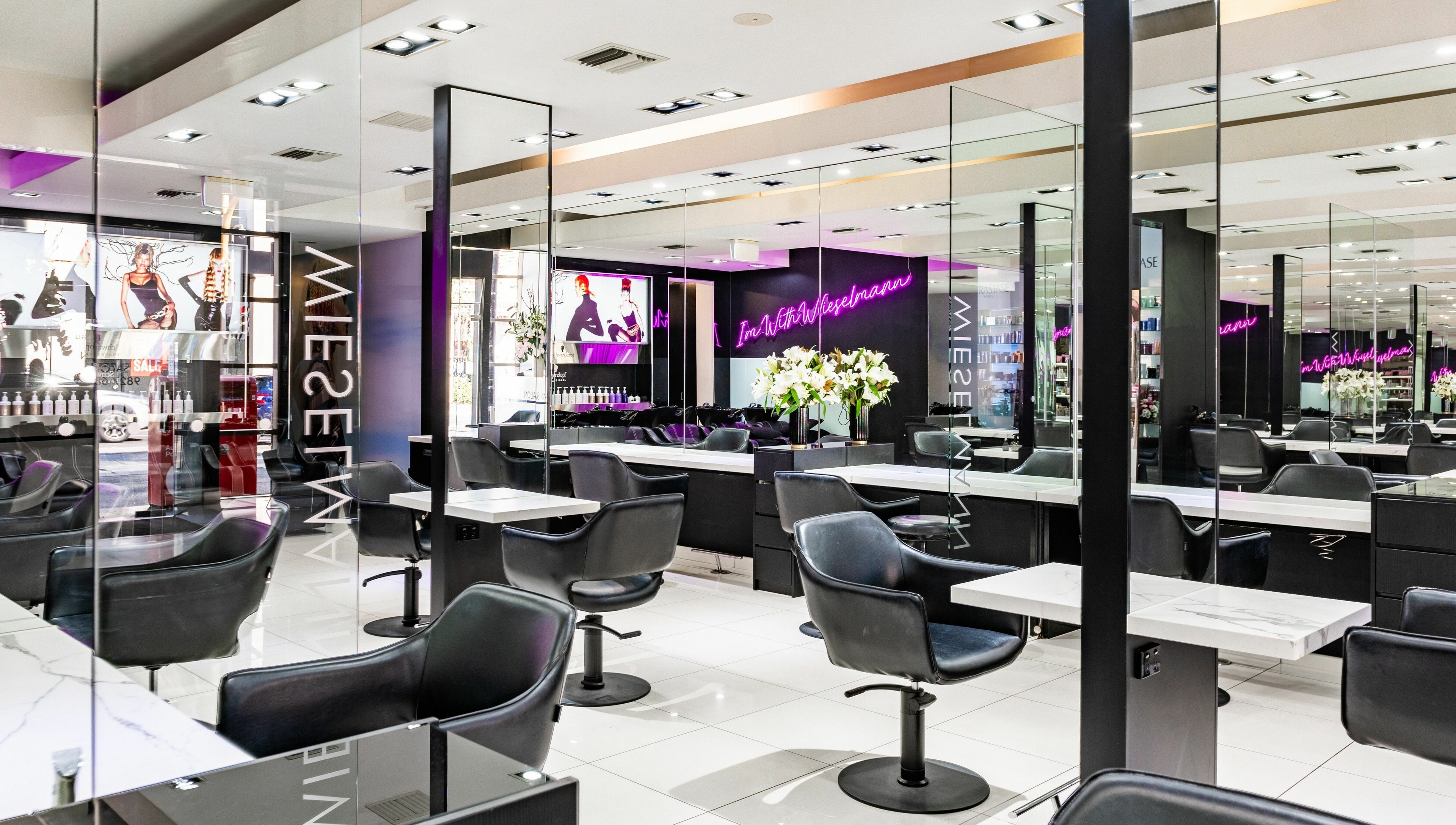 Interior of Wieselmann Salon, featuring sleek styling stations and modern decor in South Yarra, VIC, AU.