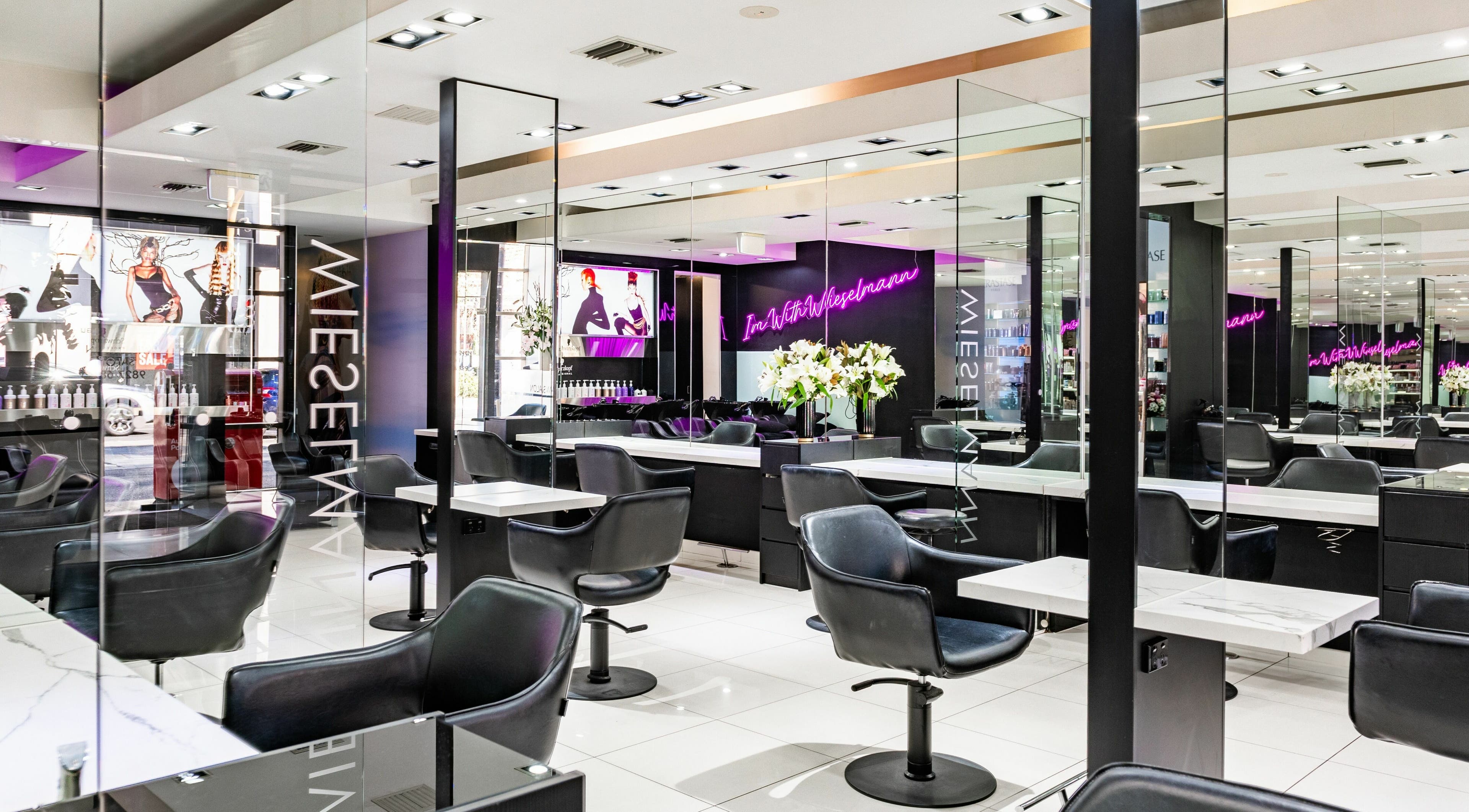 Interior of Wieselmann Salon, featuring sleek styling stations and modern decor in South Yarra, VIC, AU.