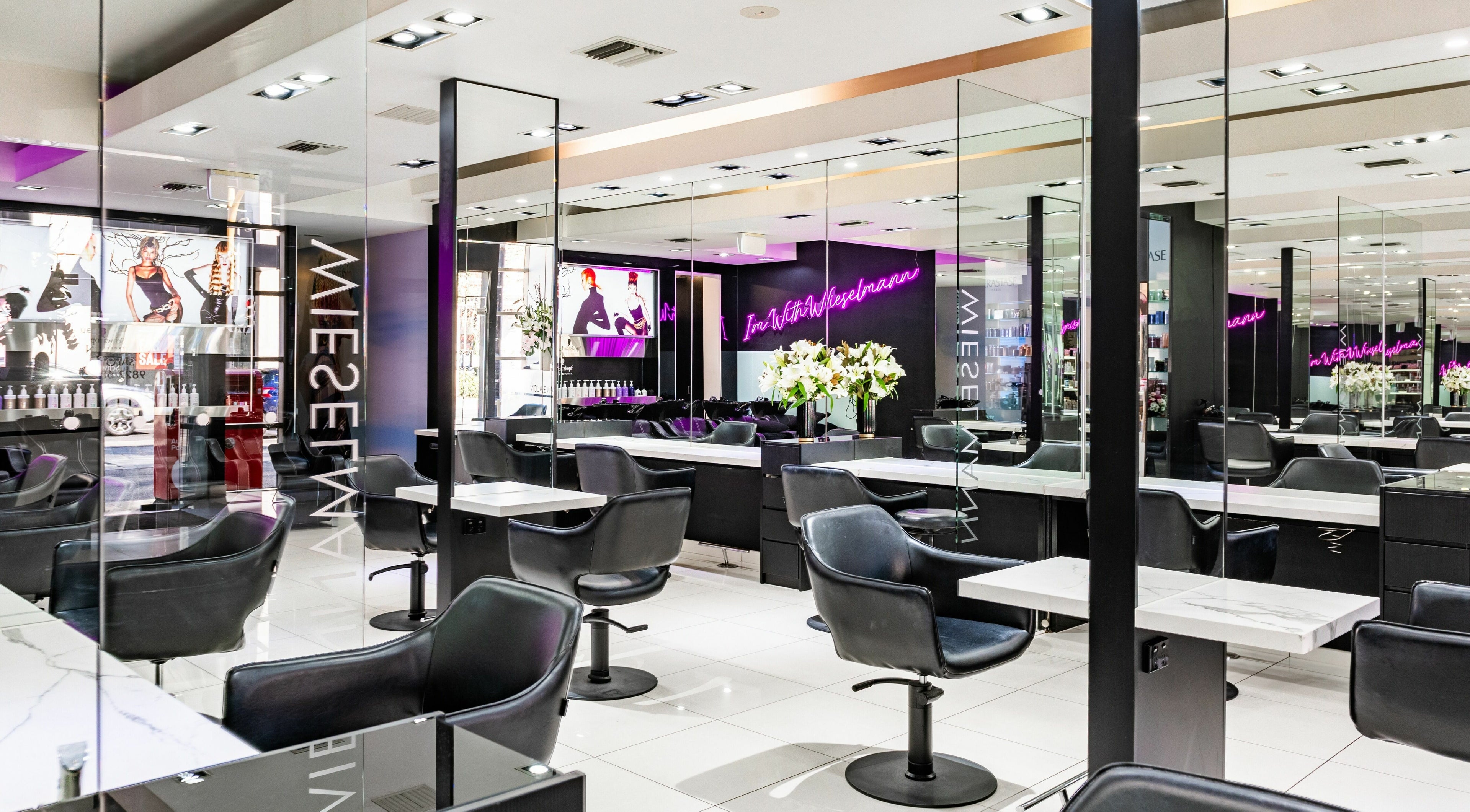Interior of Wieselmann Salon, featuring sleek styling stations and modern decor in South Yarra, VIC, AU.