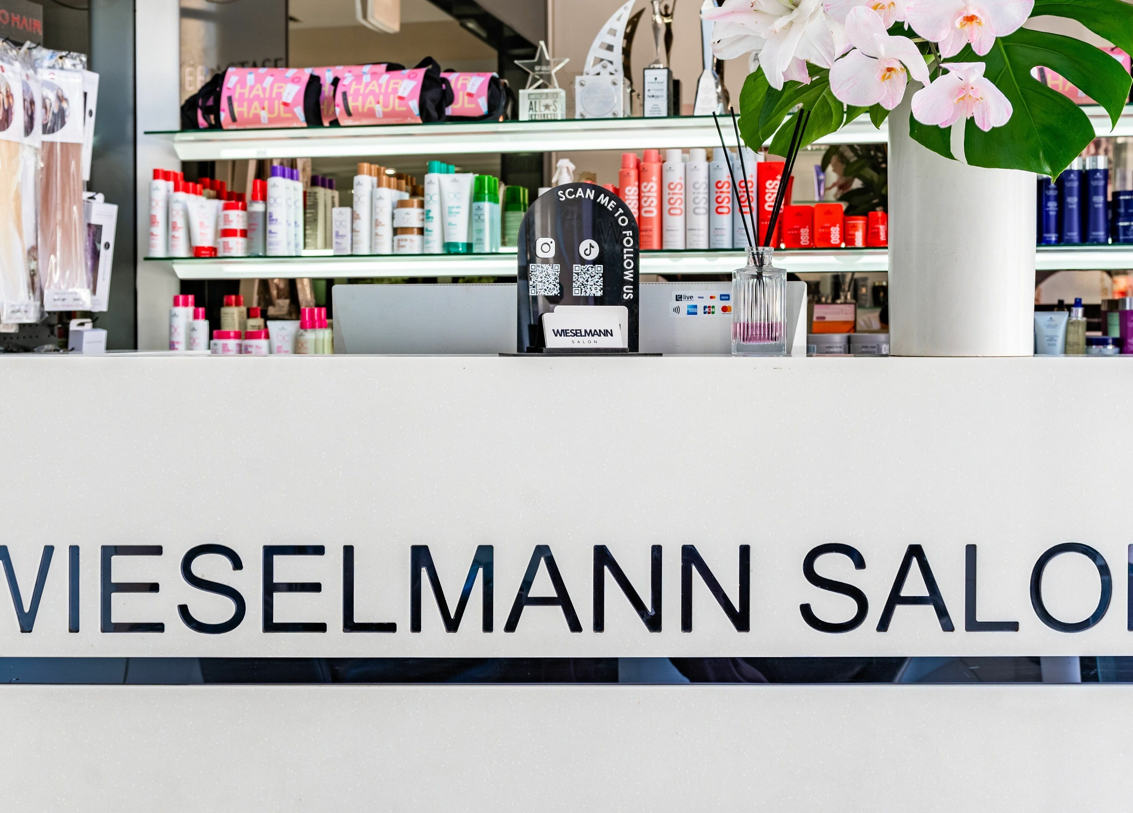 Reception of Wieselmann Salon in South Yarra, VIC, AU showcasing diverse beauty products.