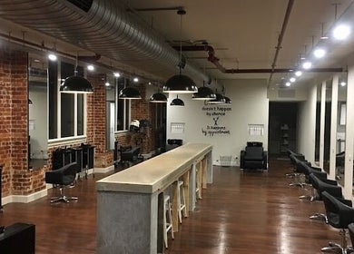 Chic interior of Sheldon Robson at head office hair suite, North Albury, New South Wales, AU with stylish mirrors and chairs.