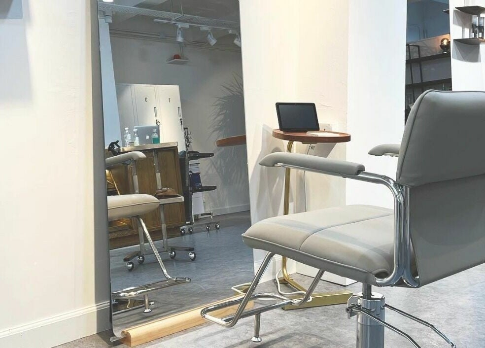 Modern salon chair at Fjino, Hong Kong Island. Sleek and stylish design for ultimate client comfort.