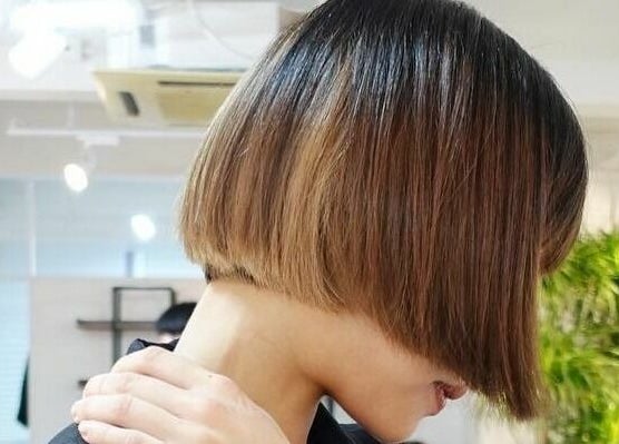 Chic bob haircut at Fjino, Hong Kong Island, HK salon showcasing sleek styling.