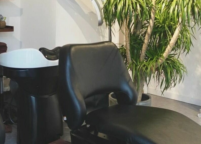 Relaxing salon space with plush chair at Fjino, Hong Kong Island, Hong Kong Island, HK.