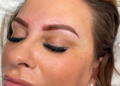 Close-up of a client's freshly styled eyebrows and lashes at Sians Bty Studio, Waterlooville, England, GB.