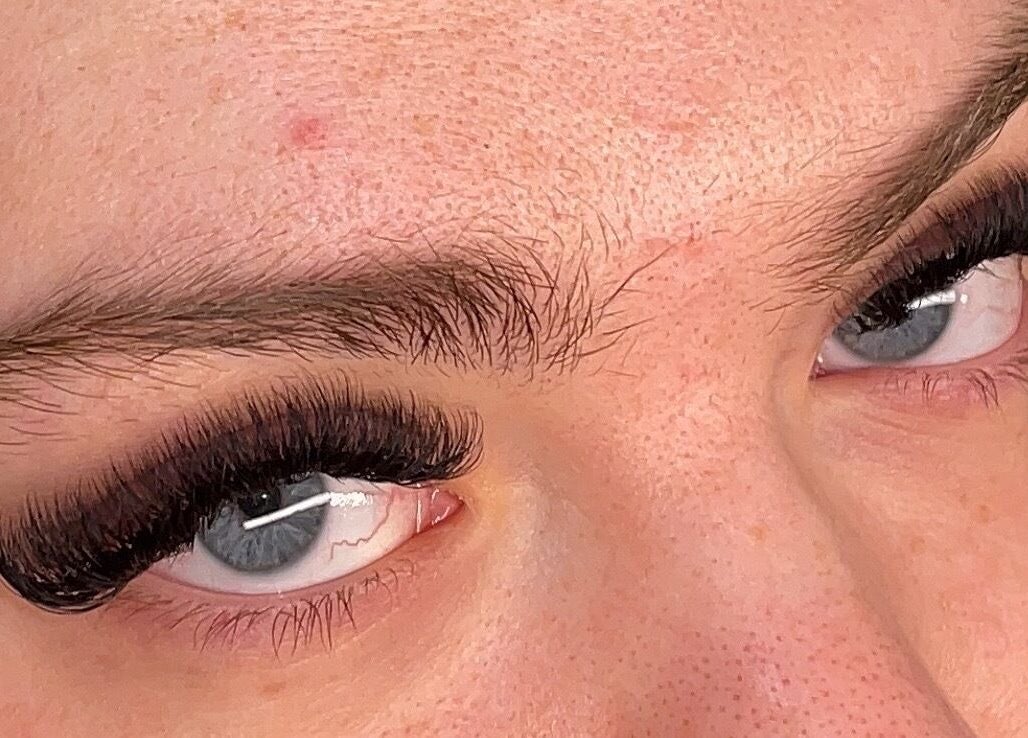 Close-up of eyelash extensions by By KB in Manchester, England, GB, showcasing detailed lash work.
