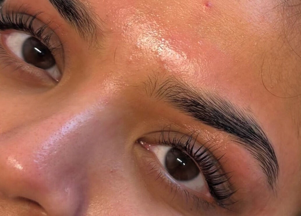 Close-up of perfectly groomed eyebrows and lashes at By KB, Manchester, England, GB.