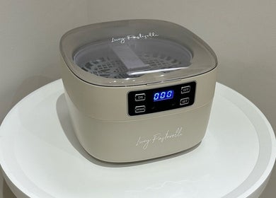 Professional ultrasonic cleaner at MD Nails, Bishop's Stortford, England, GB for precision nail care.