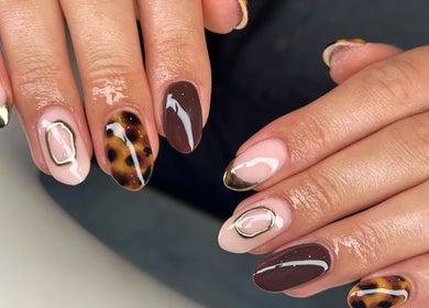 Stylish nail art at MD Nails, Bishop's Stortford, England, GB featuring modern designs and glossy finish.