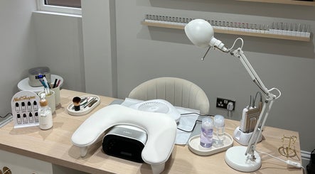 MD Nails setup in Bishop's Stortford, England, GB featuring a stylish manicure desk and tools.