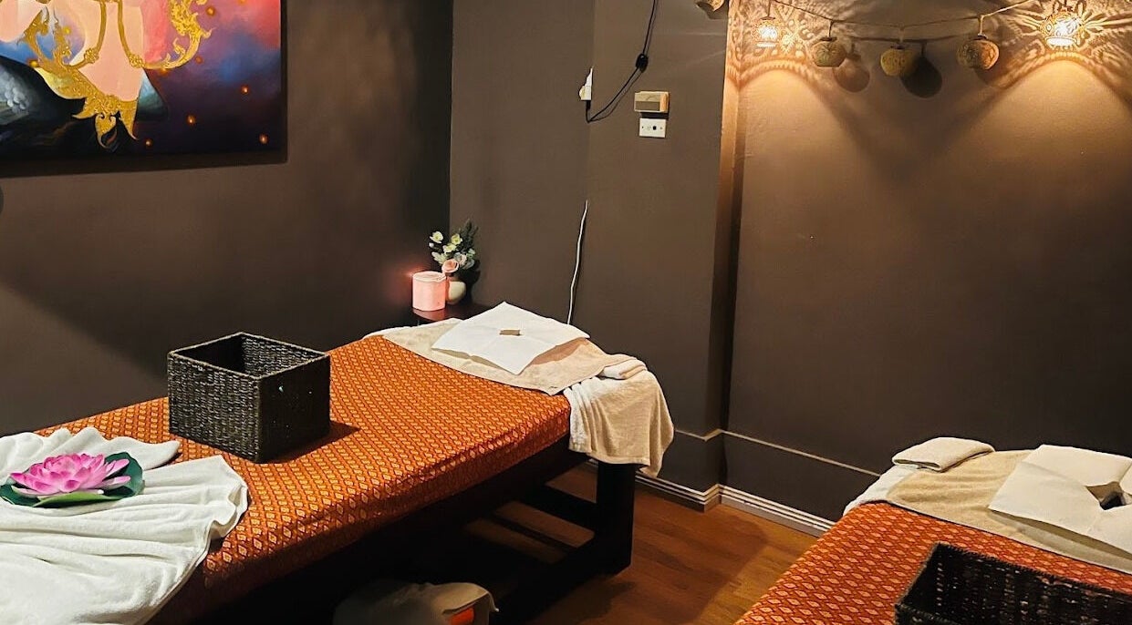 Cozy massage room at Sawanglife Thai Massage on Penrith, New South Wales, AU with warm lighting and art decor.