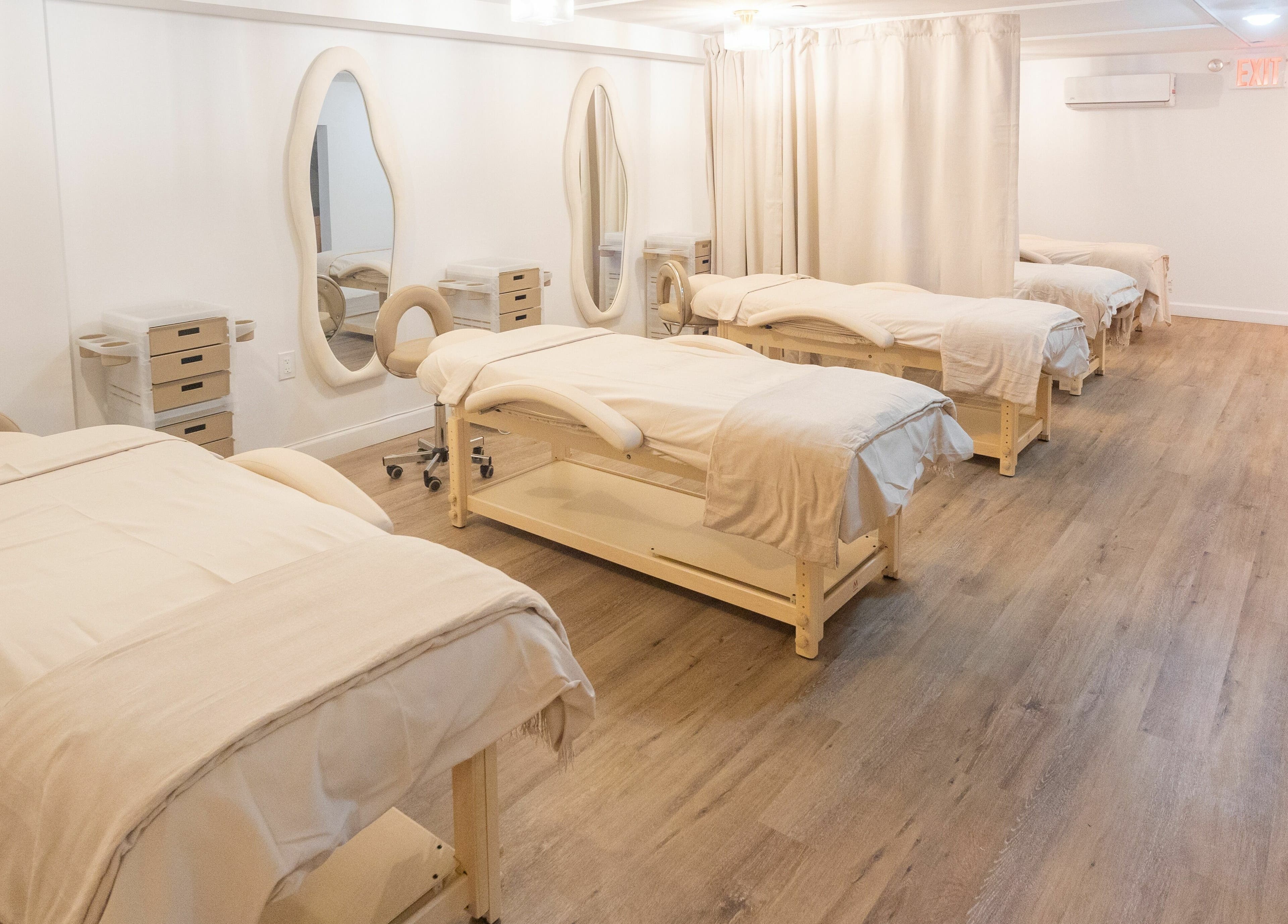 Peaceful treatment room with massage beds at TASH BLAQUE, New York, New York, US.