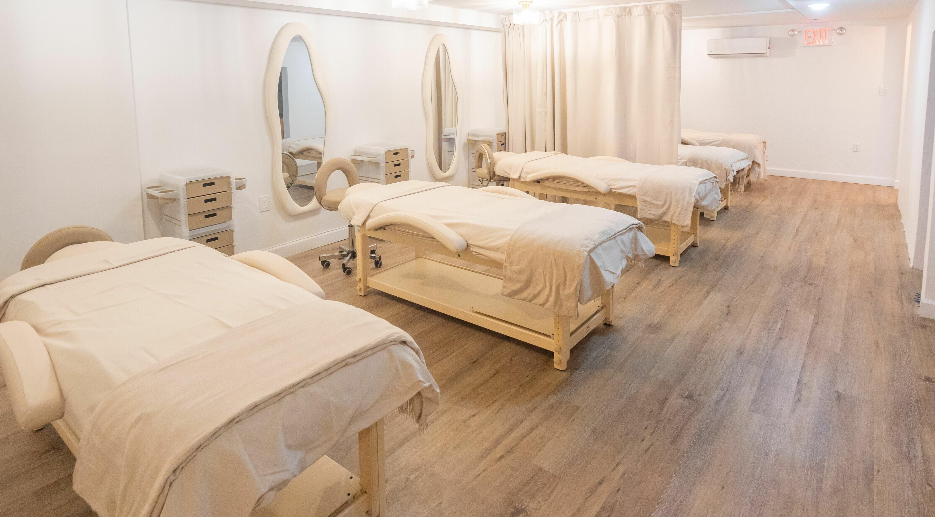 Peaceful treatment room with massage beds at TASH BLAQUE, New York, New York, US.