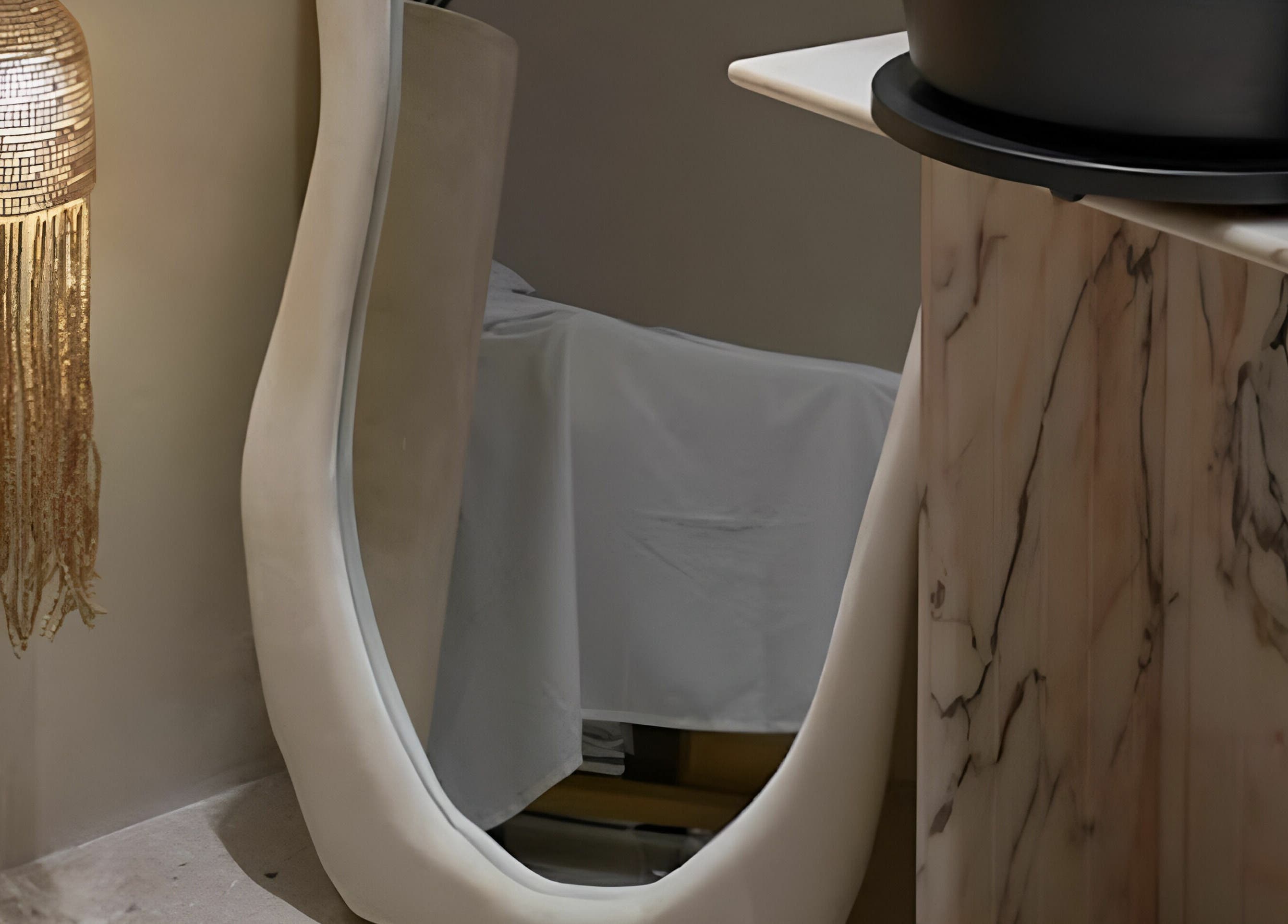Graceful mirror and lamp enhance GAARA SPA's ambiance in Doha, Doha Municipality, QA.