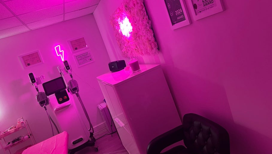 Chic pink room at Ep Laser Clinic Shrewsbury with neon lighting and modern equipment, Shrewsbury, England, GB.
