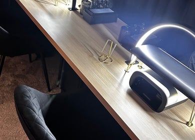 Elegant desk setup at Under The Lamp, Birmingham, England, GB with modern lighting.