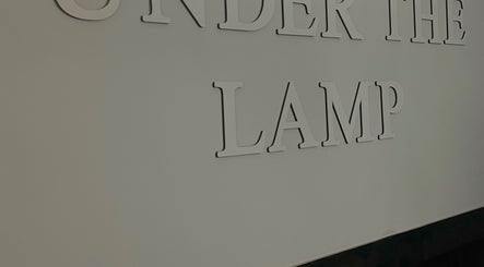 "Under The Lamp" sign on wall, Birmingham, England, GB venue.