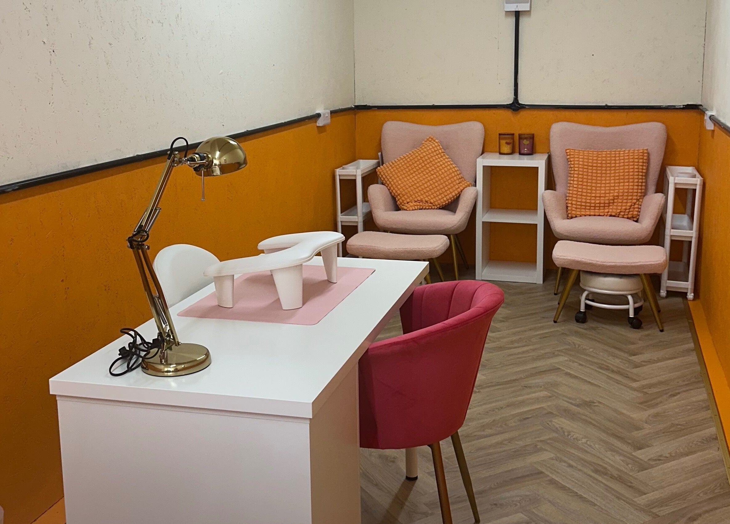 Chic manicuring space at So Gel Studio, Bristol, England, GB, featuring stylish chairs and a sleek table.