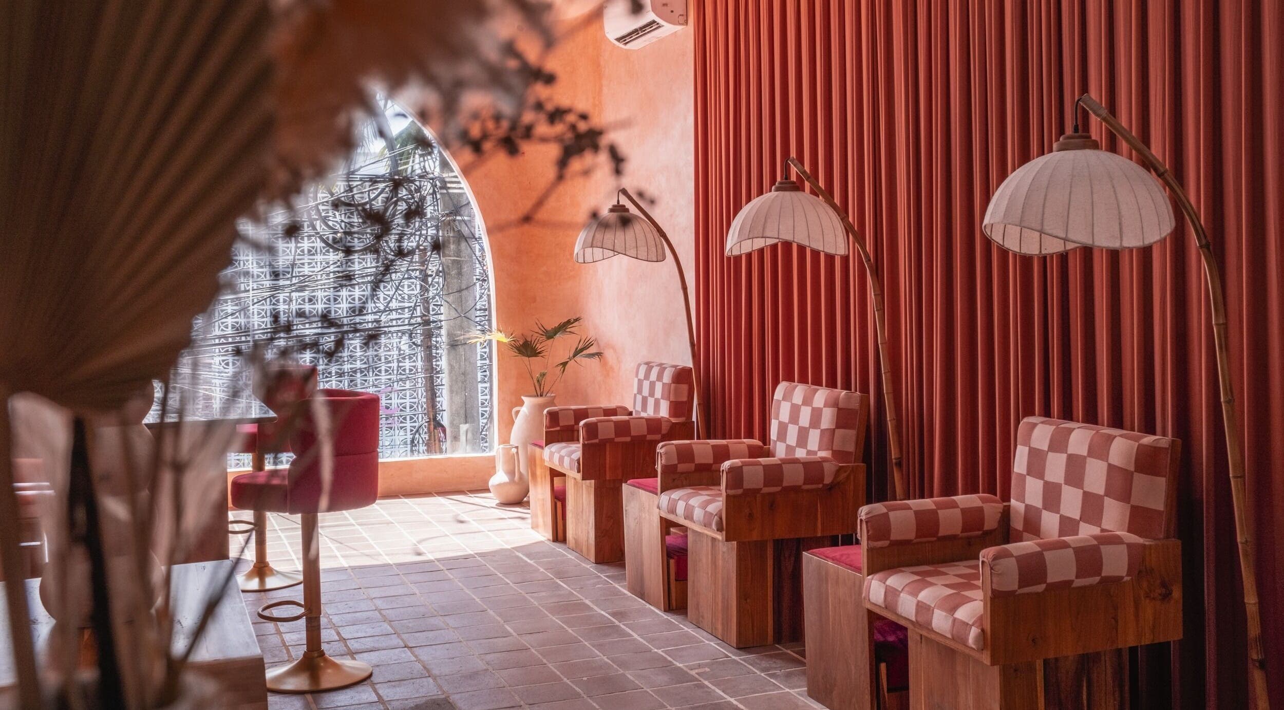 Inviting salon chairs and warm decor at Rosie's Nail Bar - Canggu, Badung, Indonesia, ID.