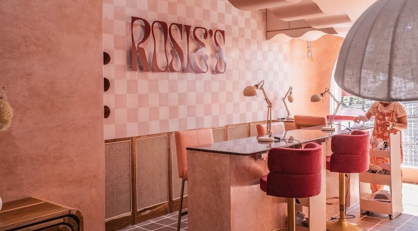 Rosie's Nail Bar - Canggu in Badung, Indonesia, ID features stylish peach and pink interiors with modern nail stations.