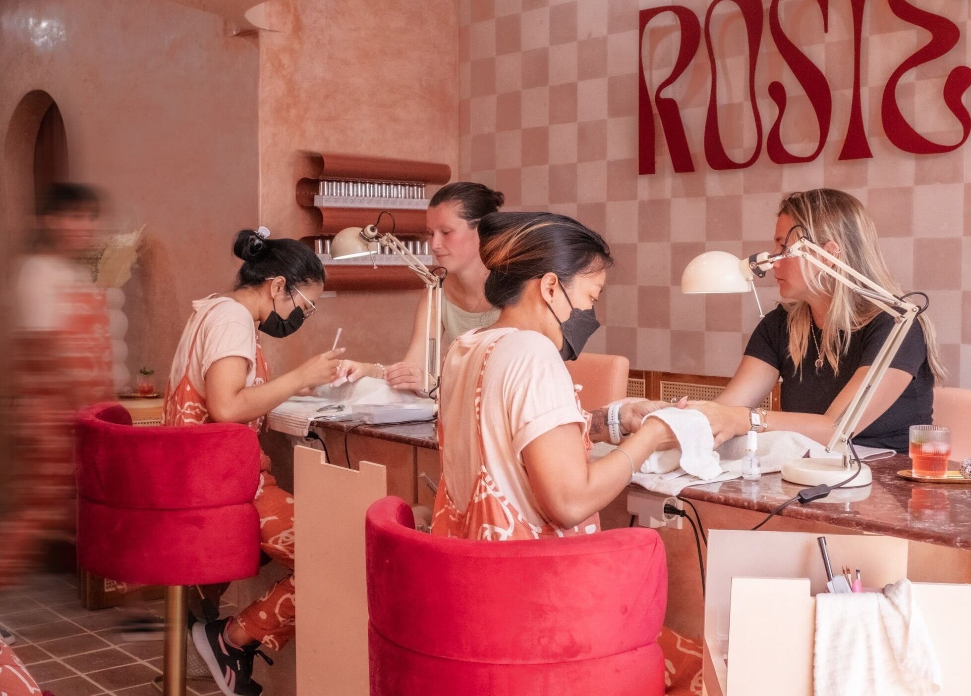 Inside Rosie's Nail Bar - Canggu, nail technicians pamper clients at Badung, Indonesia, ID.