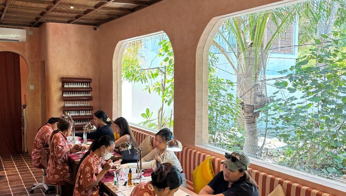 Rosies Nail Bar - Nusa Lembongan is a tranquil nail salon in Bali, Bali, ID with guests enjoying manicures.
