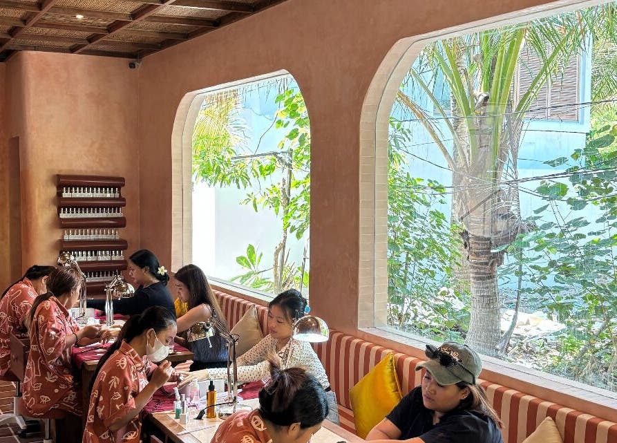 Rosies Nail Bar - Nusa Lembongan is a tranquil nail salon in Bali, Bali, ID with guests enjoying manicures.