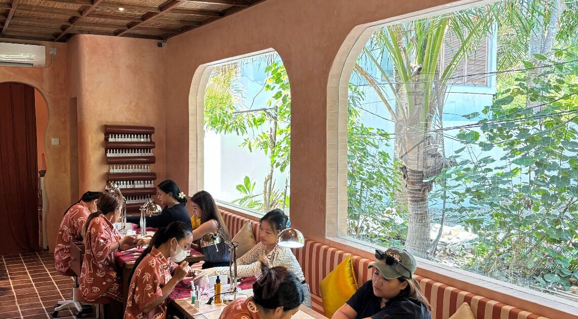 Rosies Nail Bar - Nusa Lembongan is a tranquil nail salon in Bali, Bali, ID with guests enjoying manicures.