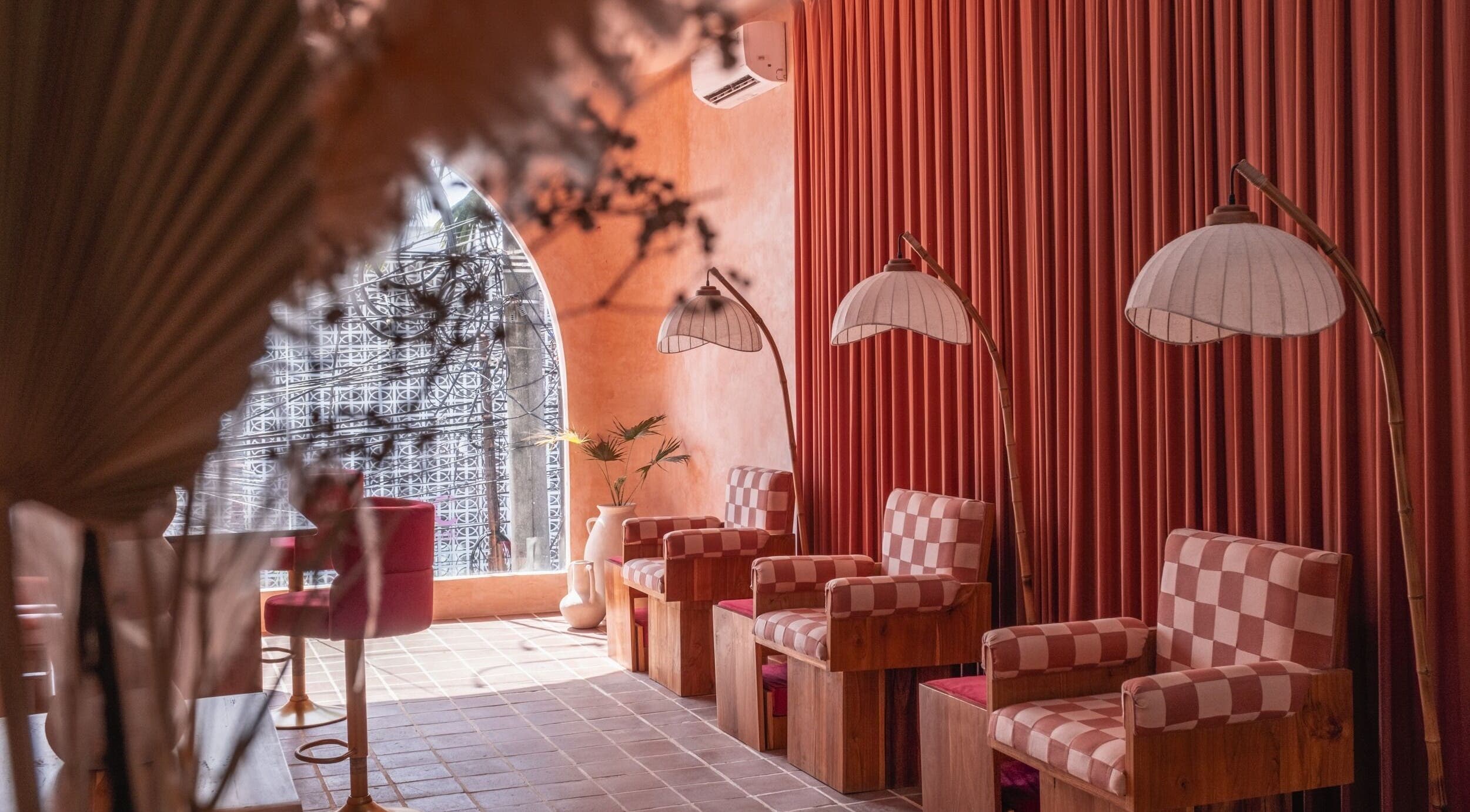 Rosies Nail Bar - Nusa Lembongan showcases chic seating with warm lighting in Bali, Bali, ID.