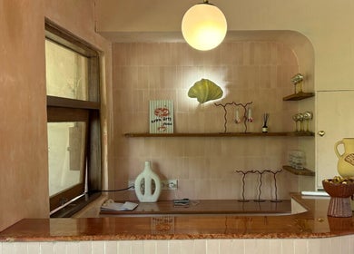 Rosies Nail Bar - Nusa Lembongan reception area in Bali, Bali, ID, featuring elegant decor and soft lighting.