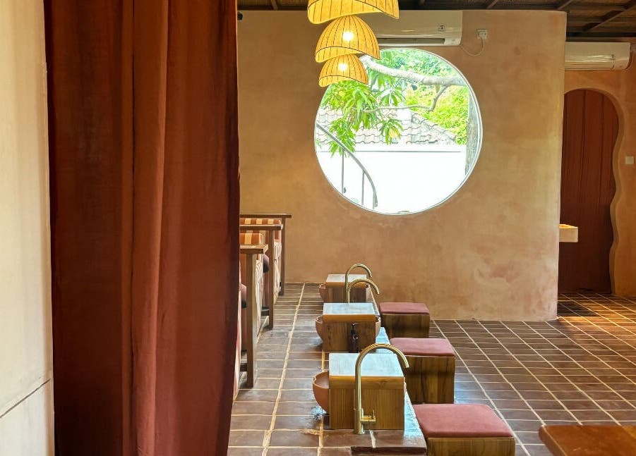 Relaxing pedicure area at Rosies Nail Bar - Nusa Lembongan, Bali, Bali, ID with natural decor and cozy seating.