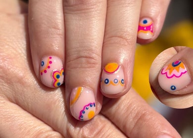 Colorful nail art at The Glossy Palette, Cape Town, Western Cape, ZA. Features intricate floral designs.