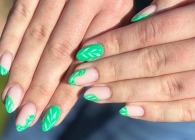 Green leaf nail art at The Glossy Palette, Cape Town, Western Cape, ZA, showcasing elegant manicure design.