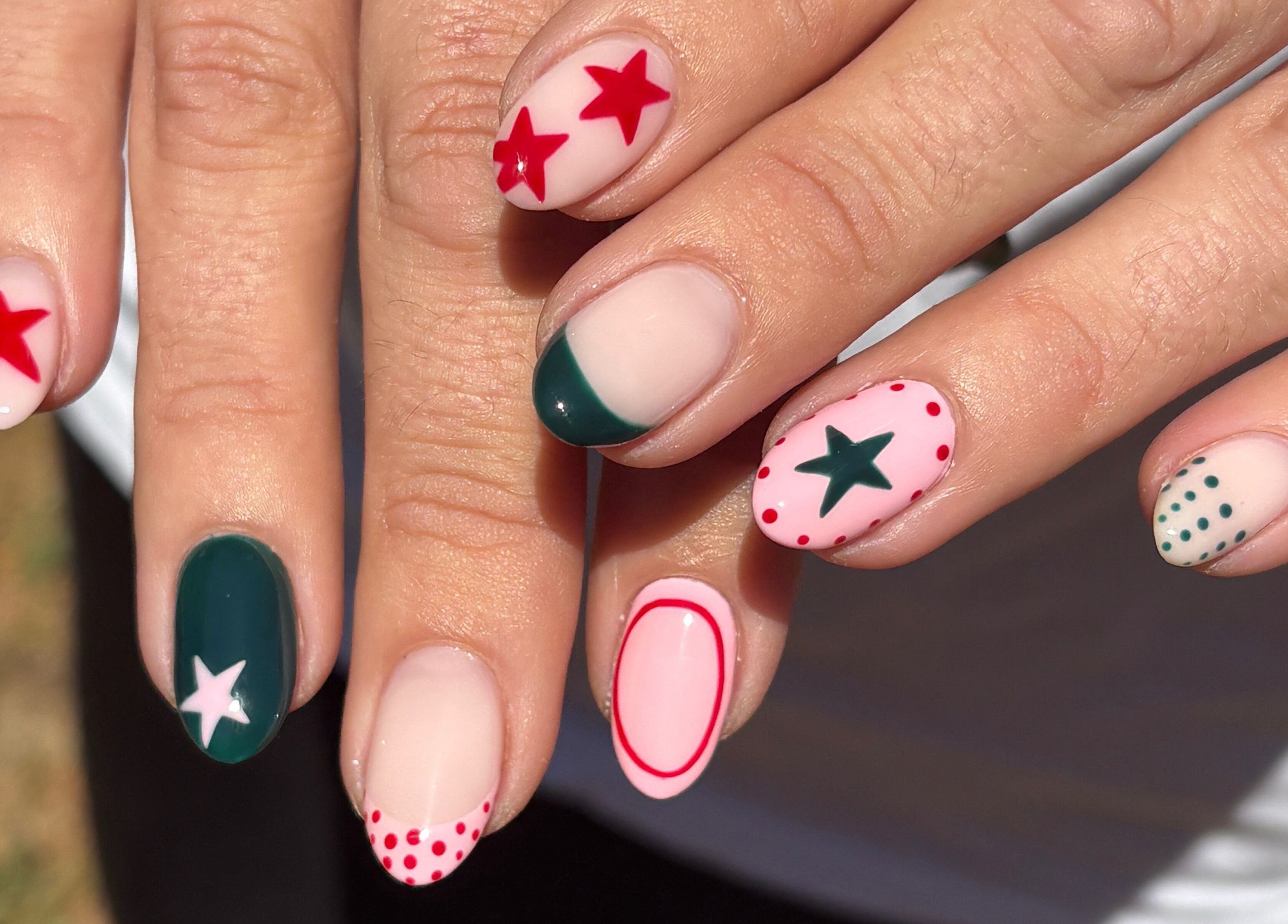 Vibrant nail art with stars at The Glossy Palette, Cape Town, Western Cape, ZA.