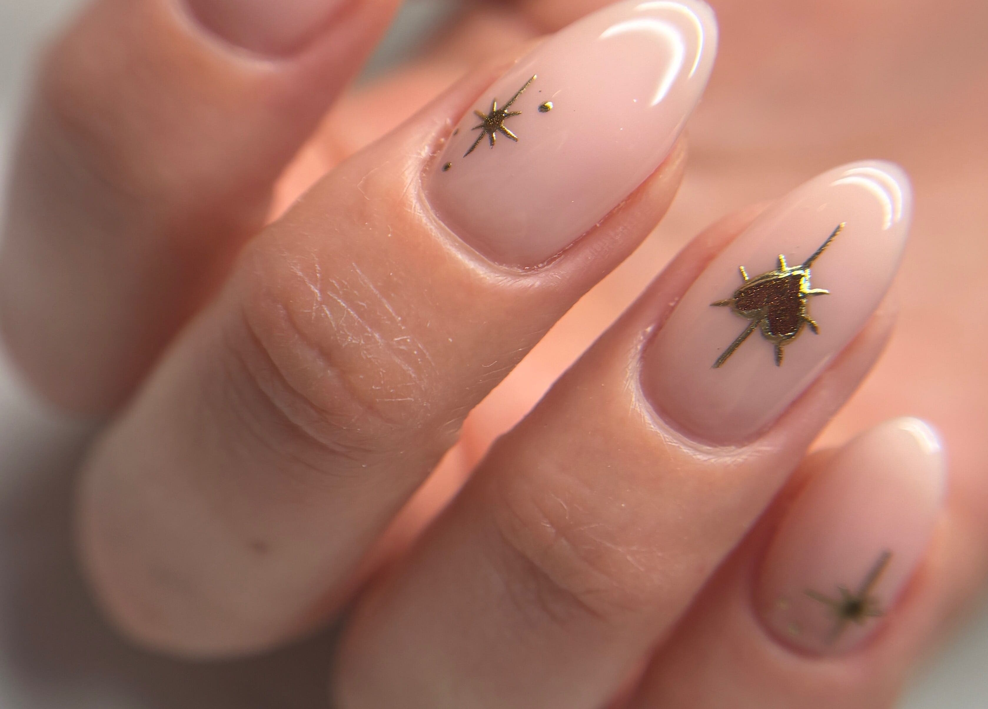 Elegant nail art at The Glossy Palette, Cape Town, Western Cape, ZA featuring delicate gold accents.