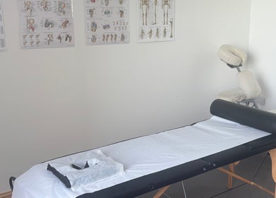 Massage therapy room with a table at What Knot Sports Massage Therapy in Preston, England, GB.