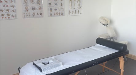 Massage therapy room with a table at What Knot Sports Massage Therapy in Preston, England, GB.