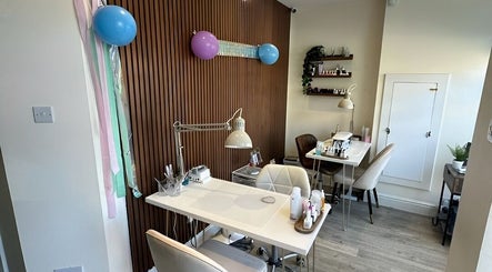 Elegant nail station at Sage Beauty By Charelle, Kilmacolm, Scotland, GB, featuring modern decor and vibrant balloons.