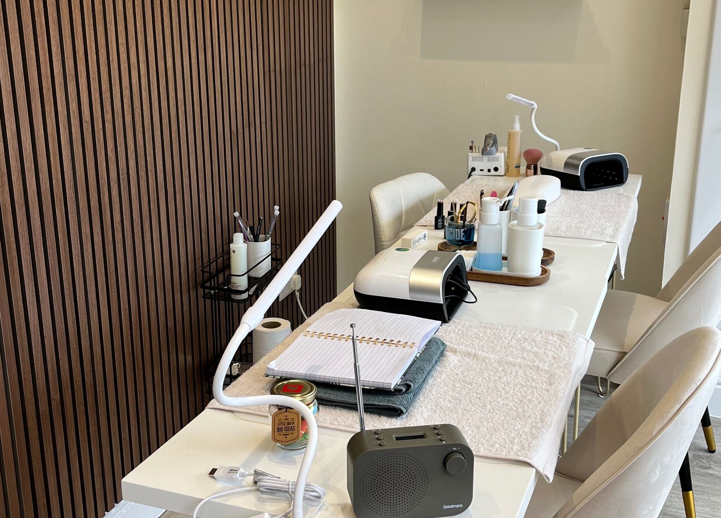 Cozy nail station at Sage Beauty By Charelle, Kilmacolm, Scotland, GB, featuring modern aesthetic and serene ambiance.