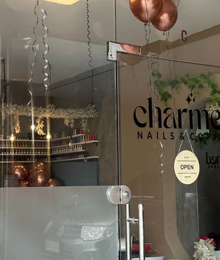 Elegant entrance of Charmed Nails & Coffee Studio, Meycauayan, Central Luzon, PH, showcasing stylish decor.