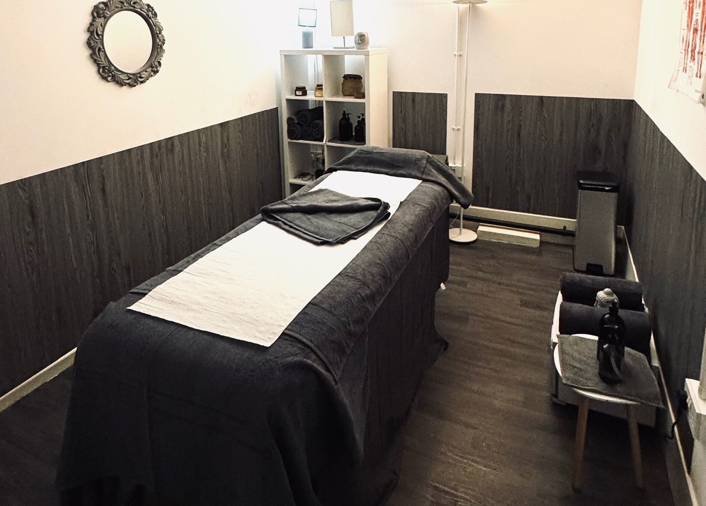 Tranquil massage room at Unity Therapy - Tamworth - B78 3RW, Fazeley. Cozy setting with a massage table and decor.