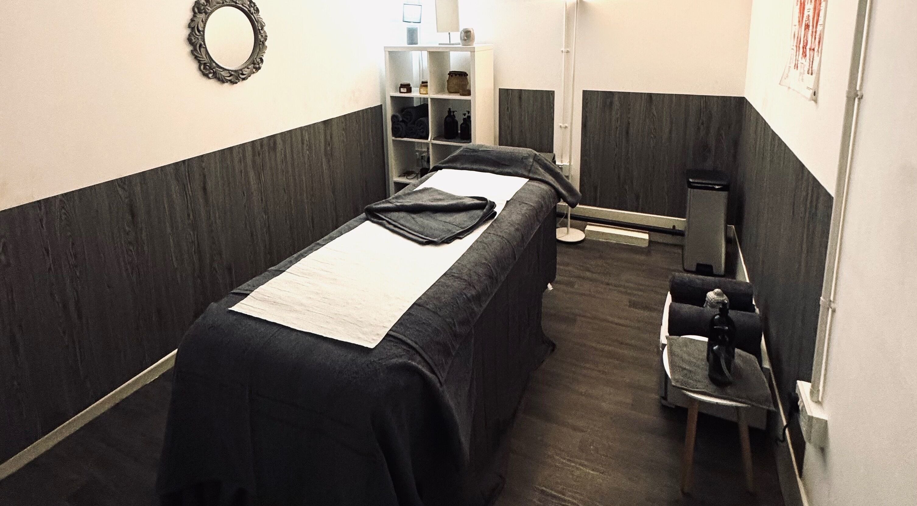 Tranquil massage room at Unity Therapy - Tamworth - B78 3RW, Fazeley. Cozy setting with a massage table and decor.