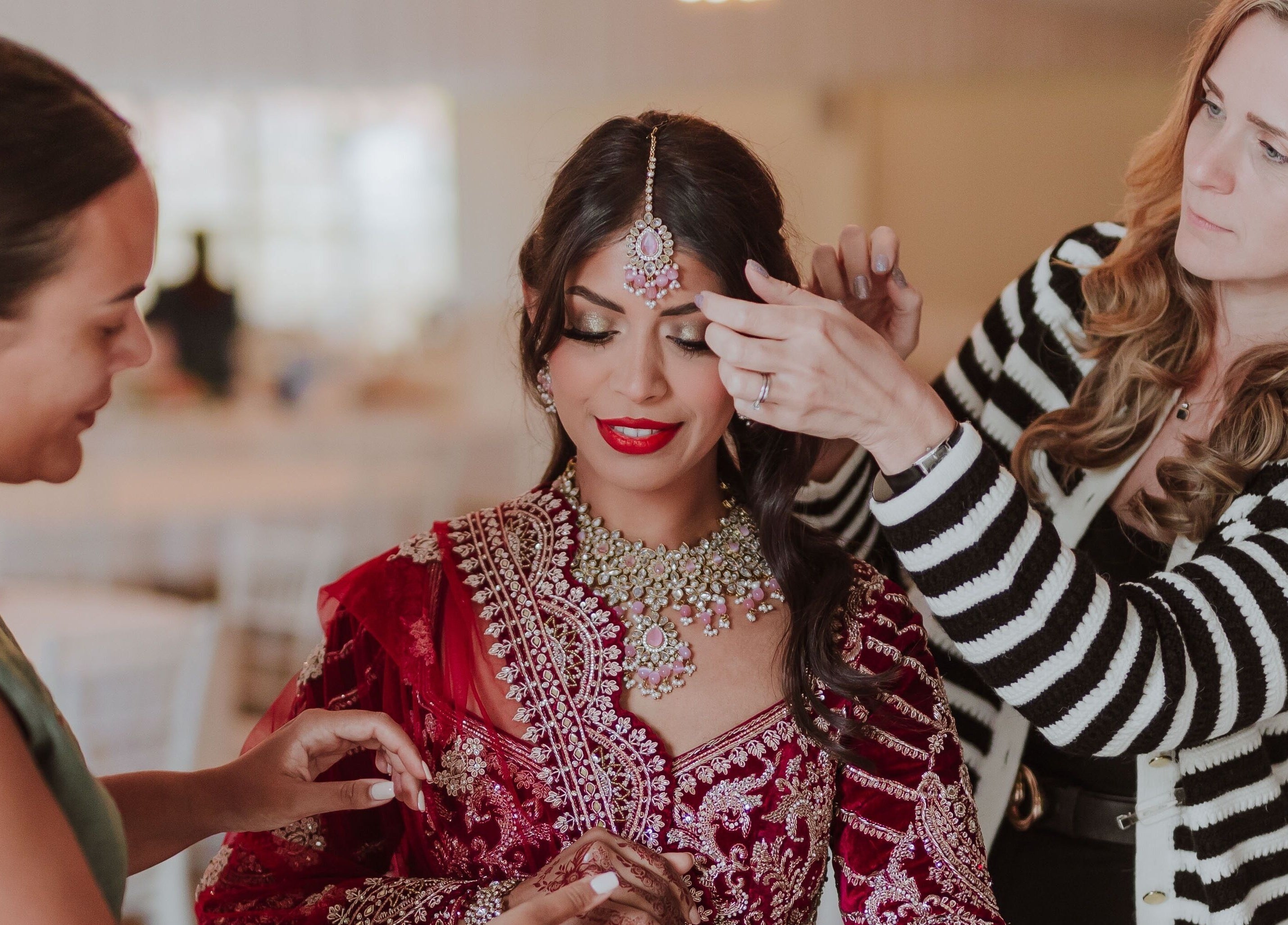 Makeup by Elisha Simon enhances bridal beauty in Northampton, England, GB with intricate detailing.