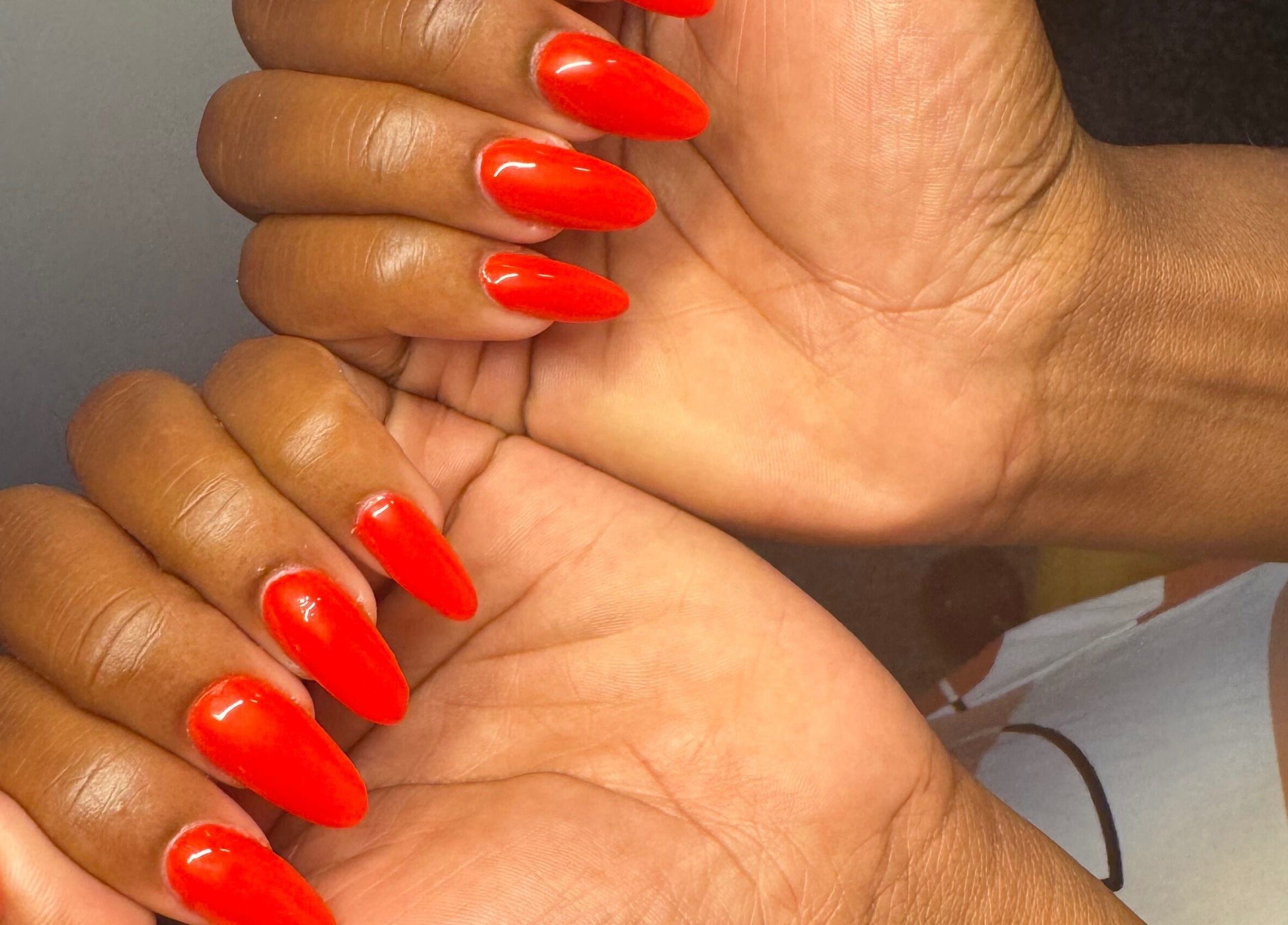 Bright red nails manicure at B's Nails, Gosport, England, GB showcasing stylish and vibrant nail art.