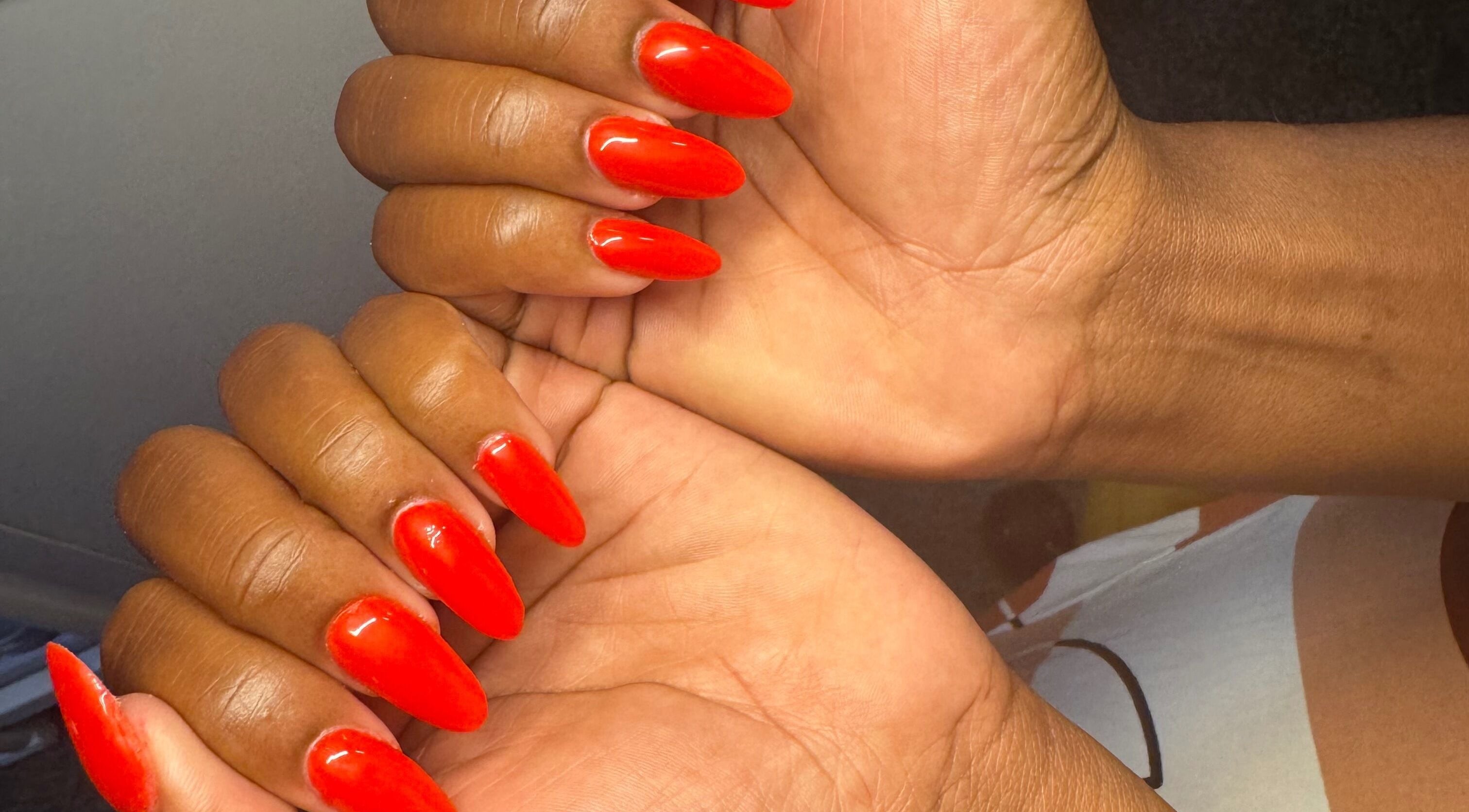 Bright red nails manicure at B's Nails, Gosport, England, GB showcasing stylish and vibrant nail art.