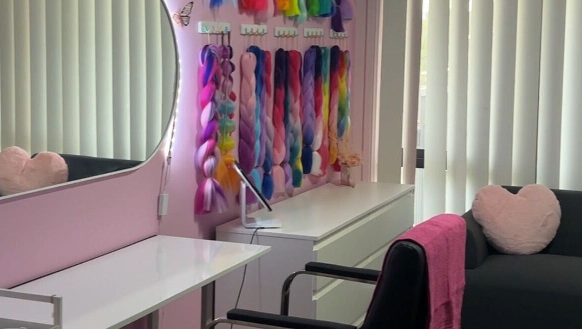 Vibrant braid wall and cozy decor at MAD'S BEAUTY BAR, Gregory Hills, New South Wales, AU.